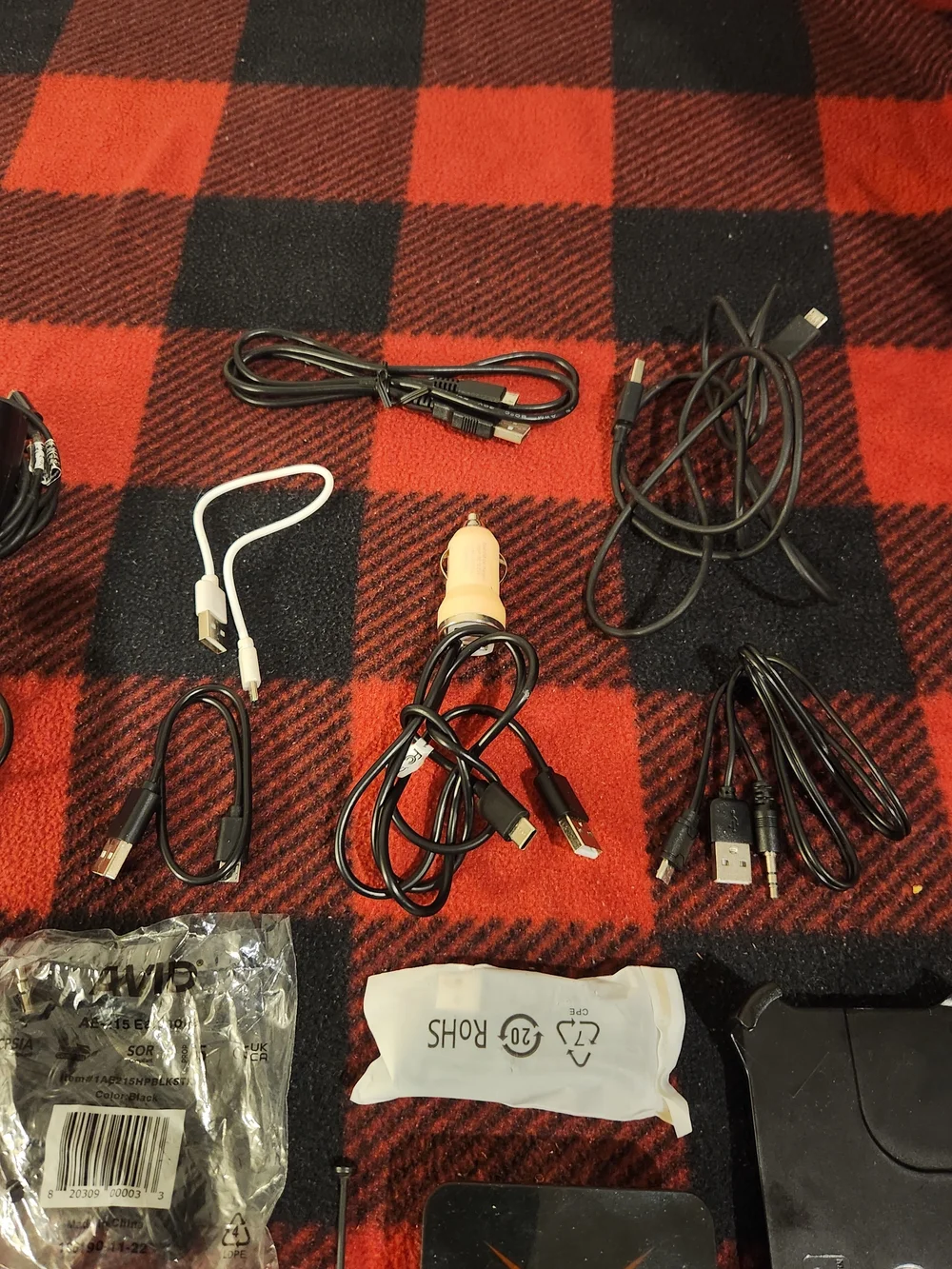 Elctronics Lot, Cellphones, Charging Cords, Remotes, And More